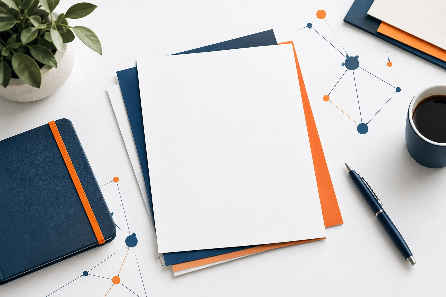 Blank planning papers arranged neatly on a calm workspace.